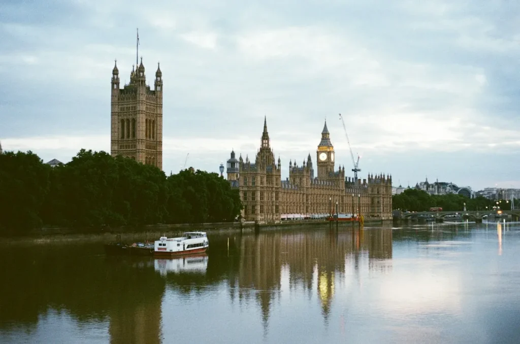 Houses of Parliament reflected in the River Thames, London