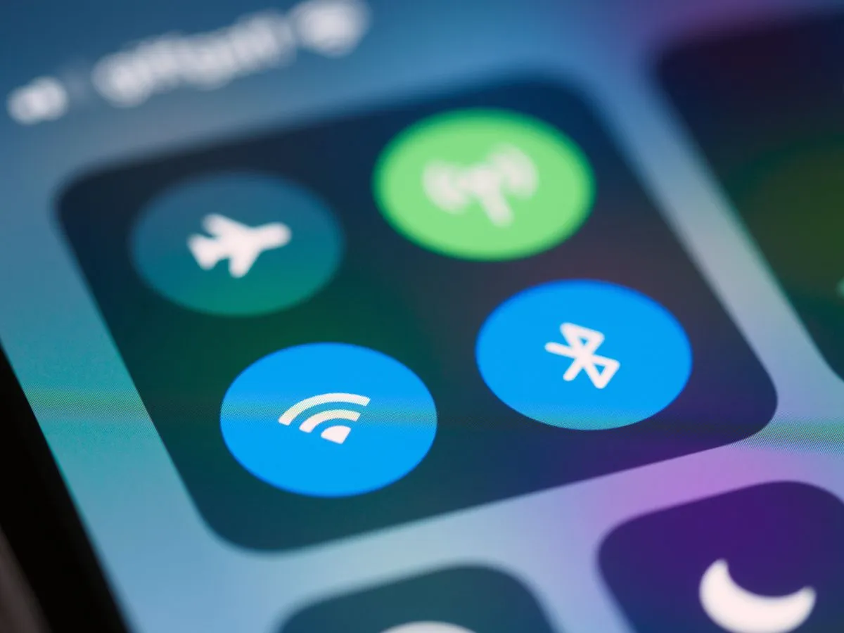 Close-up of a phone's Wi-Fi, mobile data and Bluetooth toggles